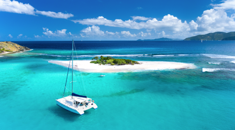 Beginner sailing on calm waters with clear skies
